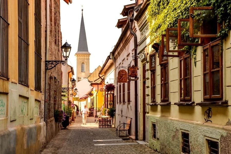 A beautiful church and colourful houses in Slovakia.