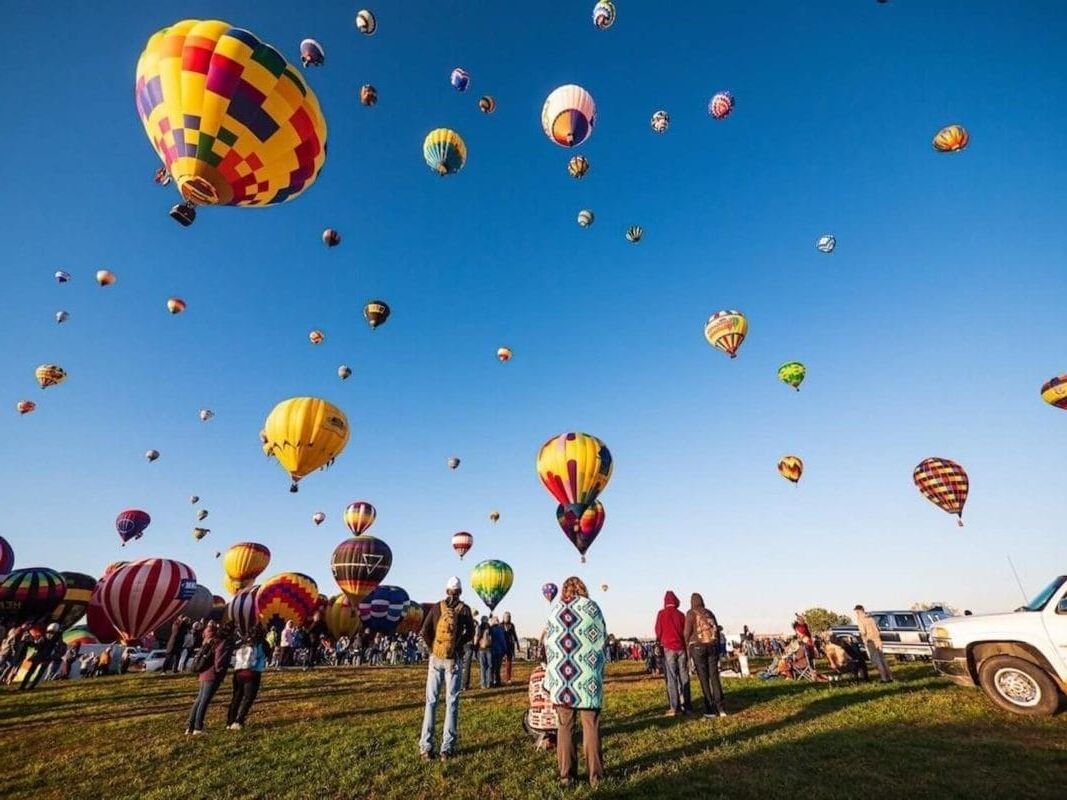 hot air balloons flying during a clear sunny day