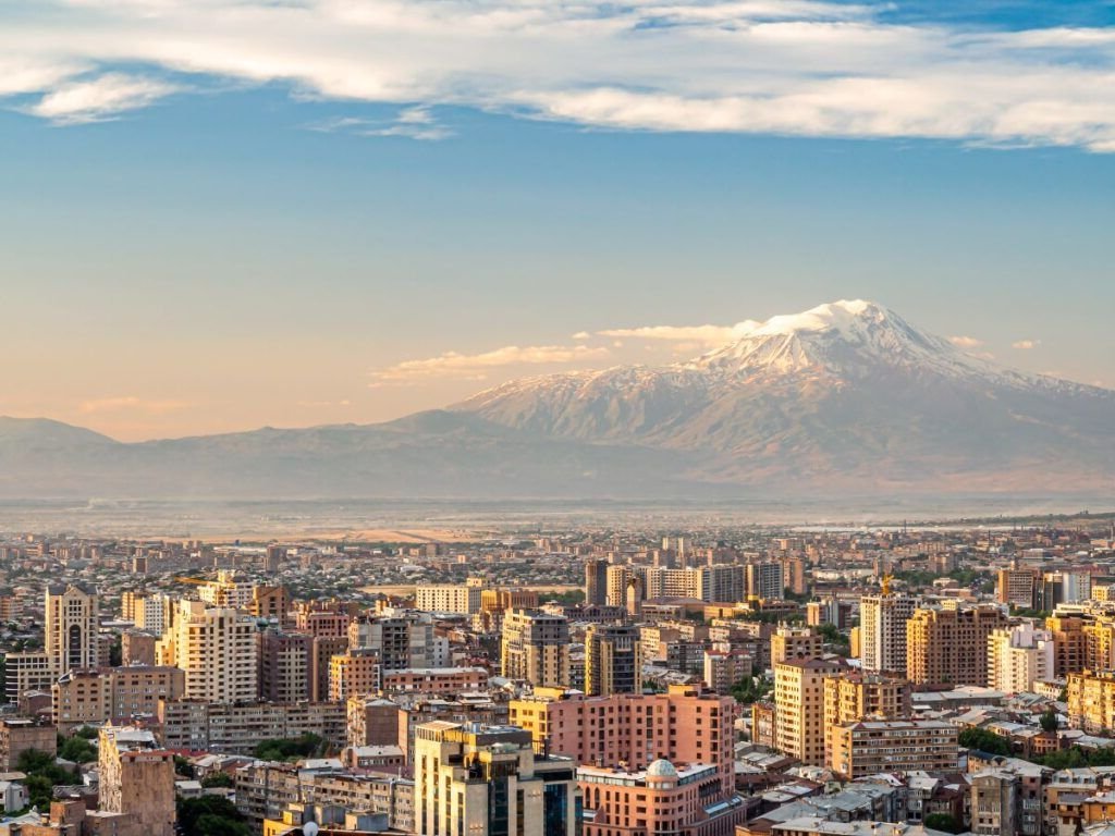 A cascade mountain in the sunset over Armenia.