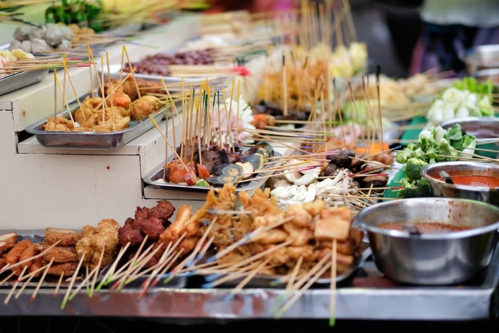different kinds of foods on skewers for sale in malaysia