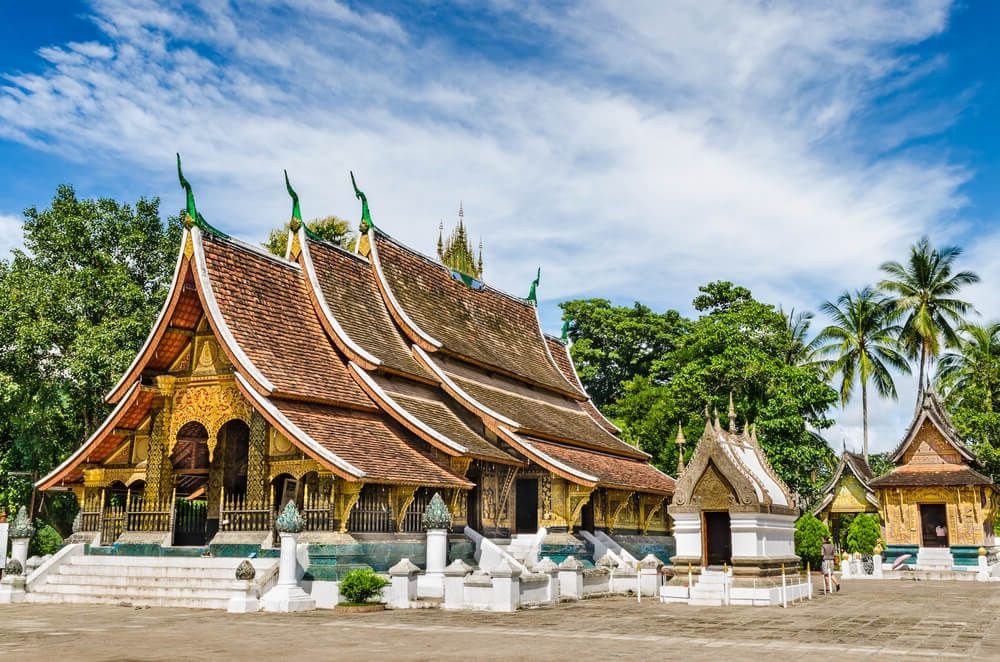 beautiful golden colors of a temple in laos, in the former capital city of luang prabang